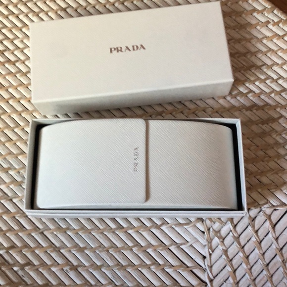 Brand new Prada swirl arm Sunglasses